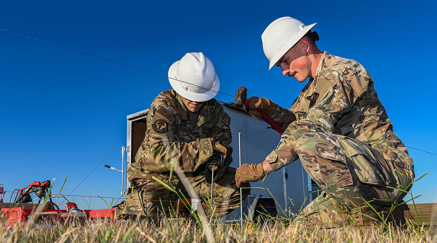 airmen working on electrical systems