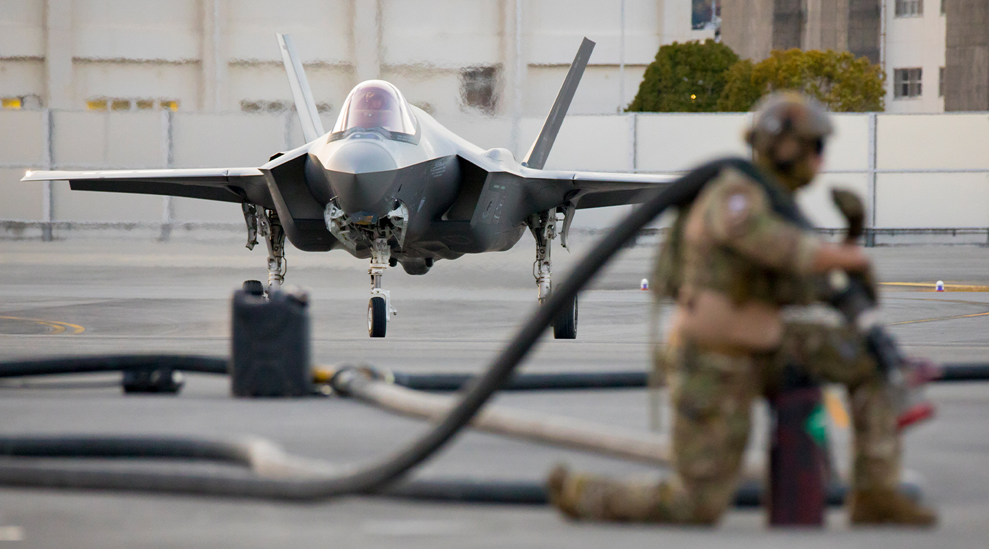 airmen working on equipment