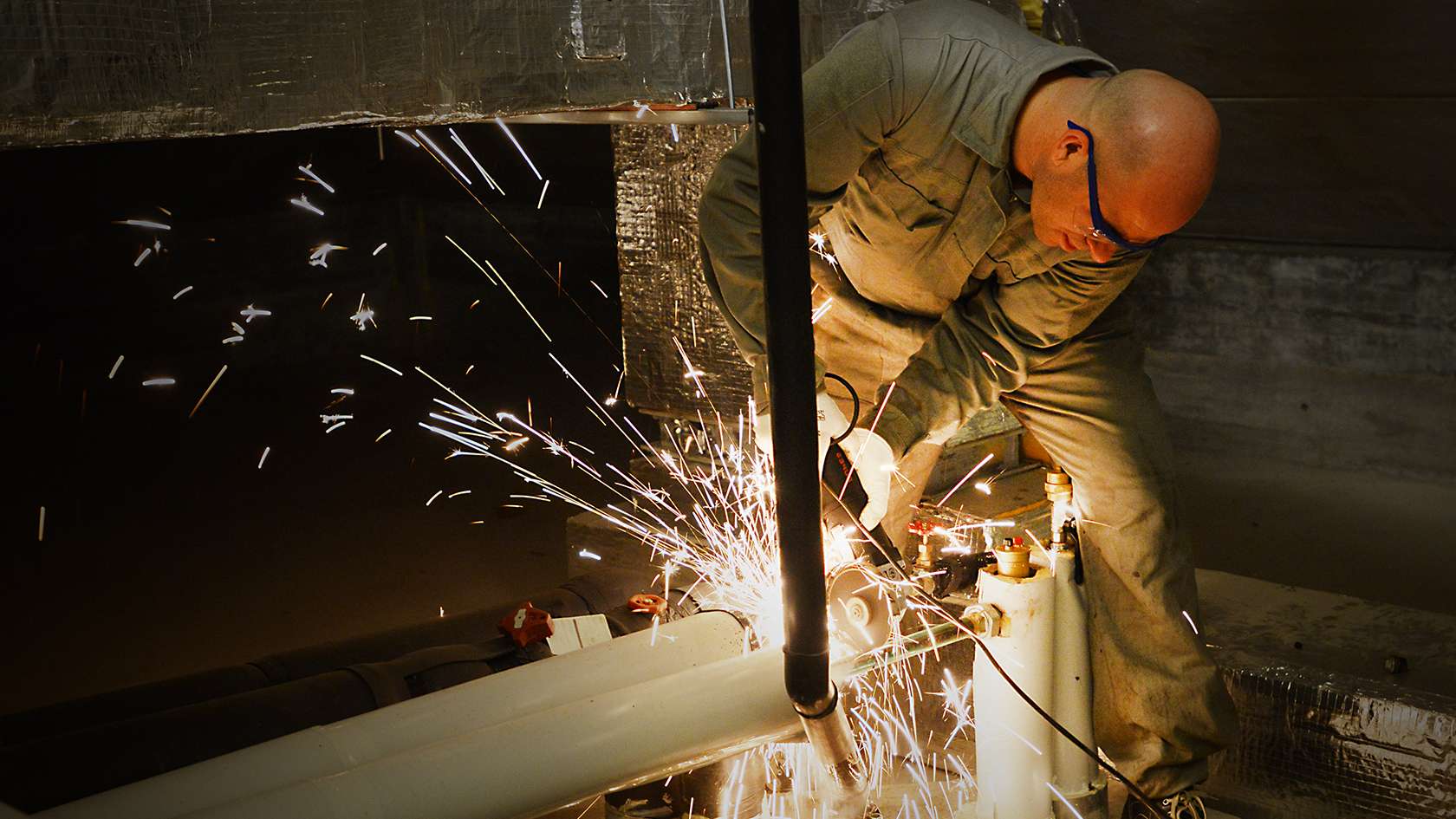 airman grinding on metal