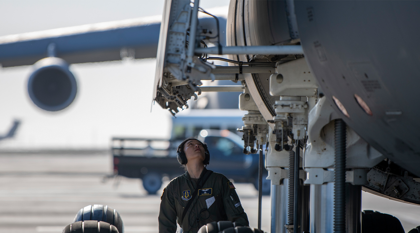 airmen working on aircraft