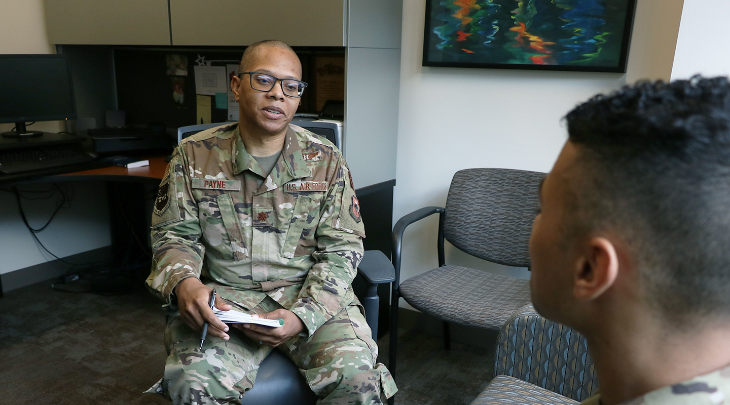 psychiatrist talking to a patient