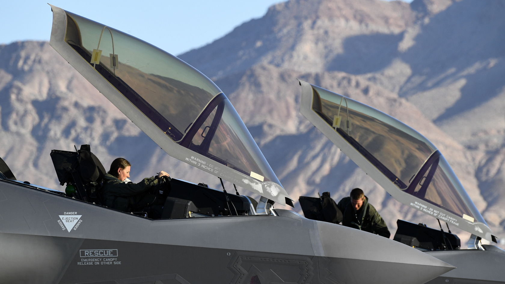 airmen getting into cockpit