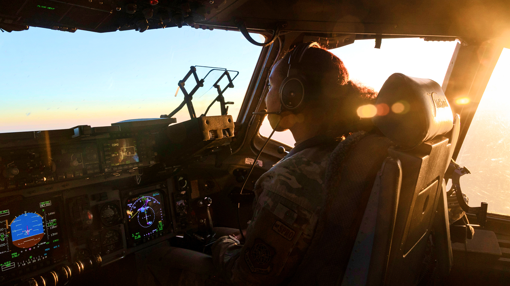 airmen flying at sunrise