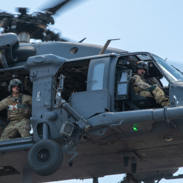 airmen in helicopter