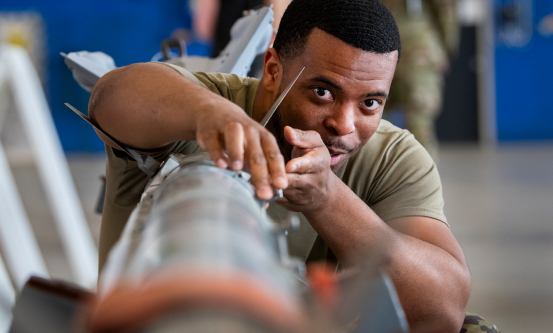 airman performning maintenance