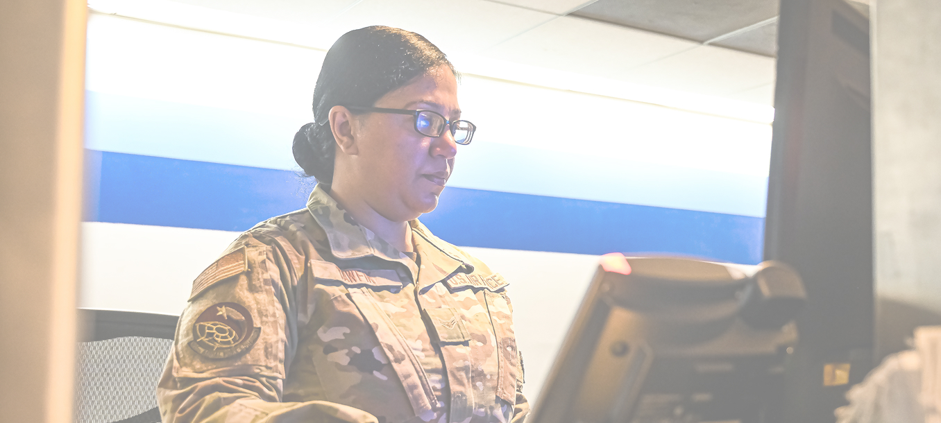 airman in front of a laptop