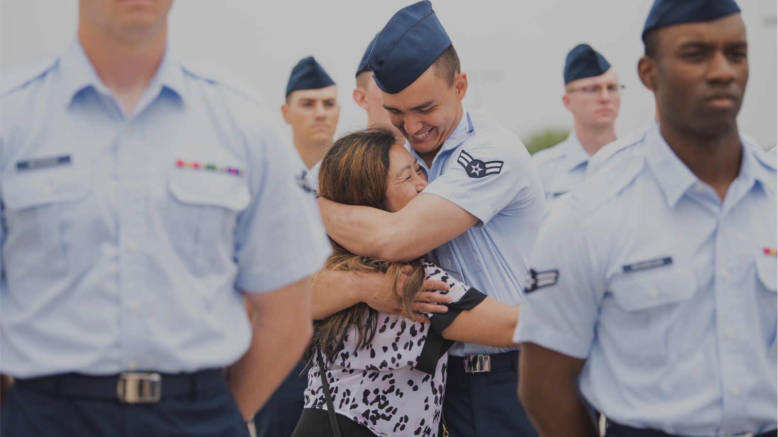 Young Airman hugging his mother