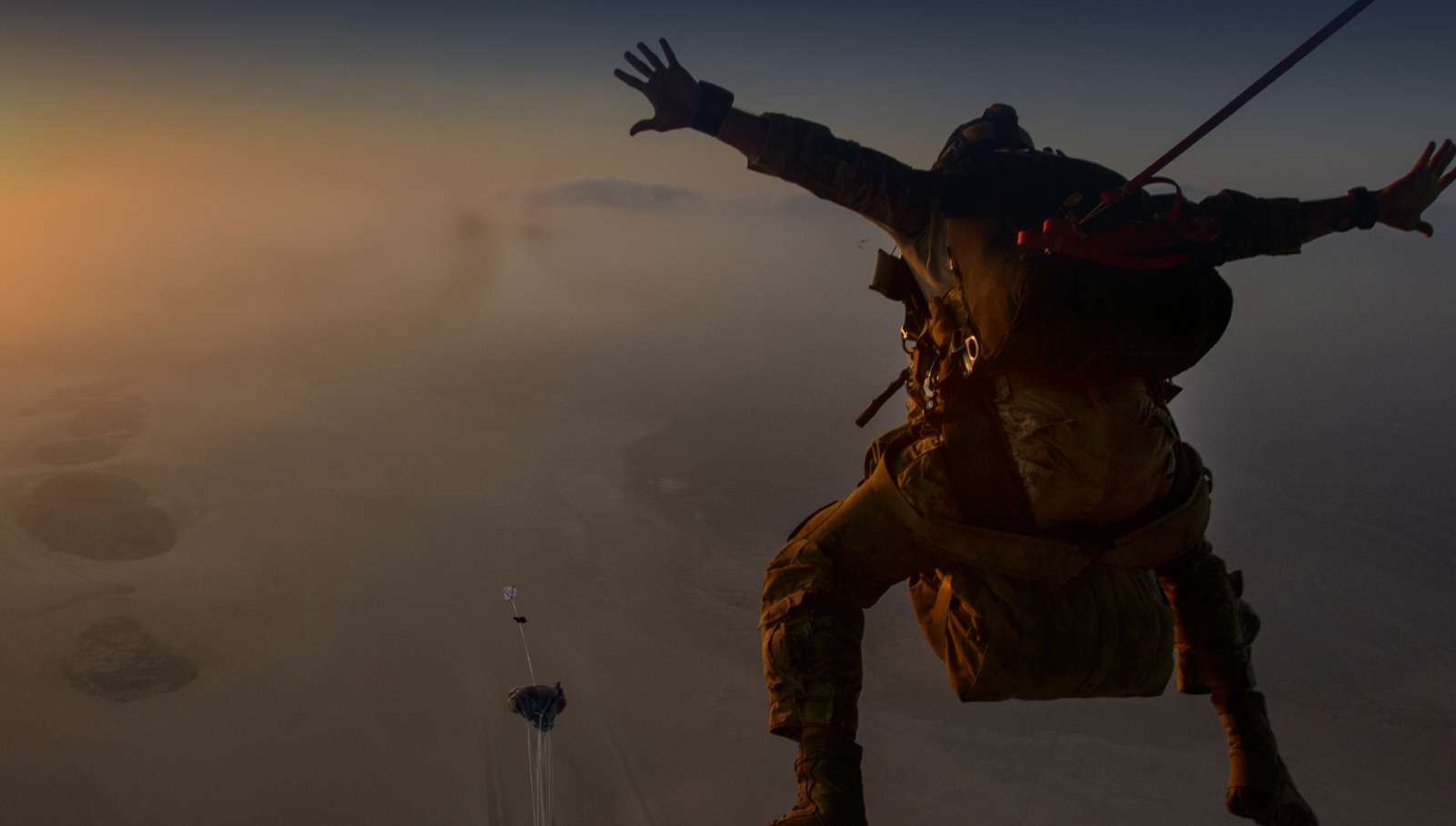 Airman jumping from airplane