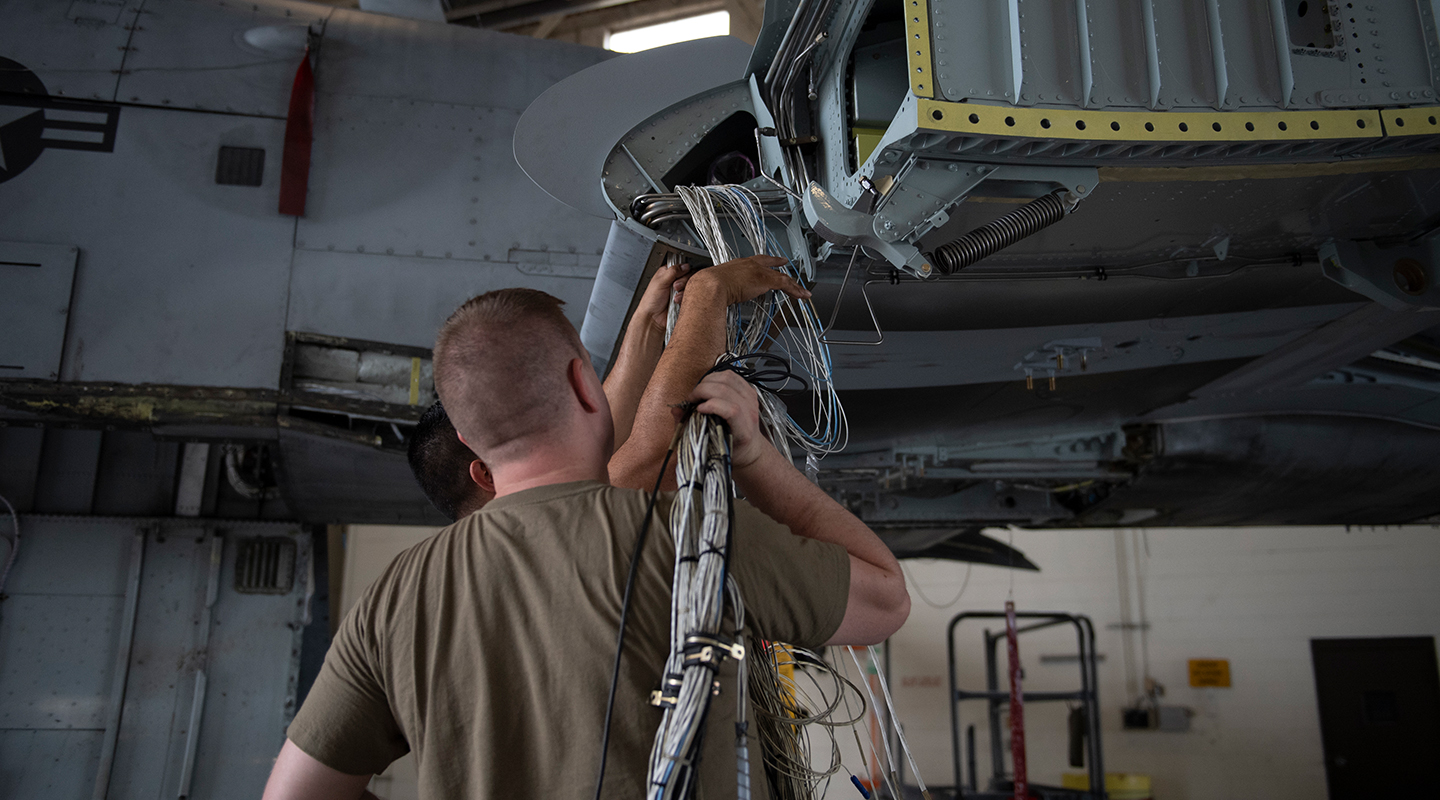 airmen performing maintenance work