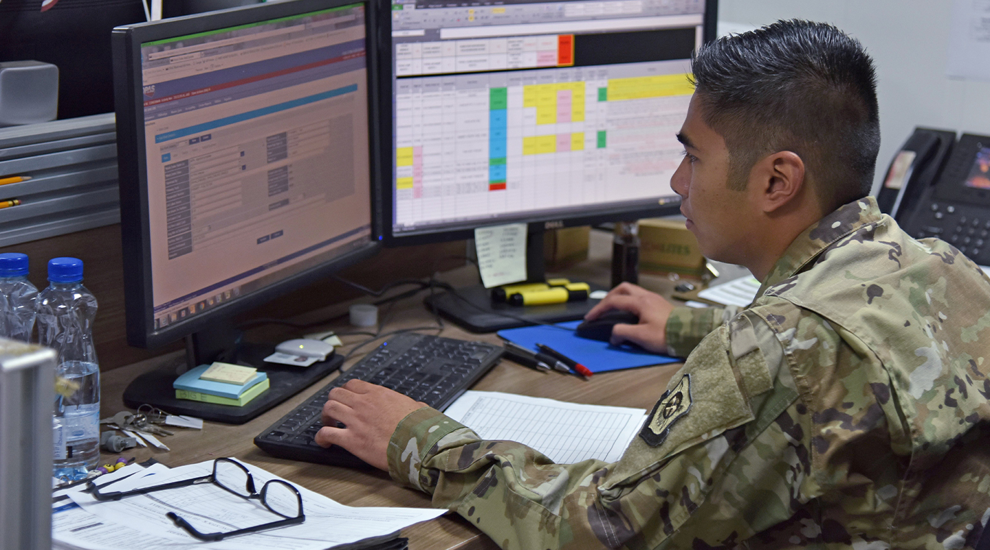 airman using desktop computer