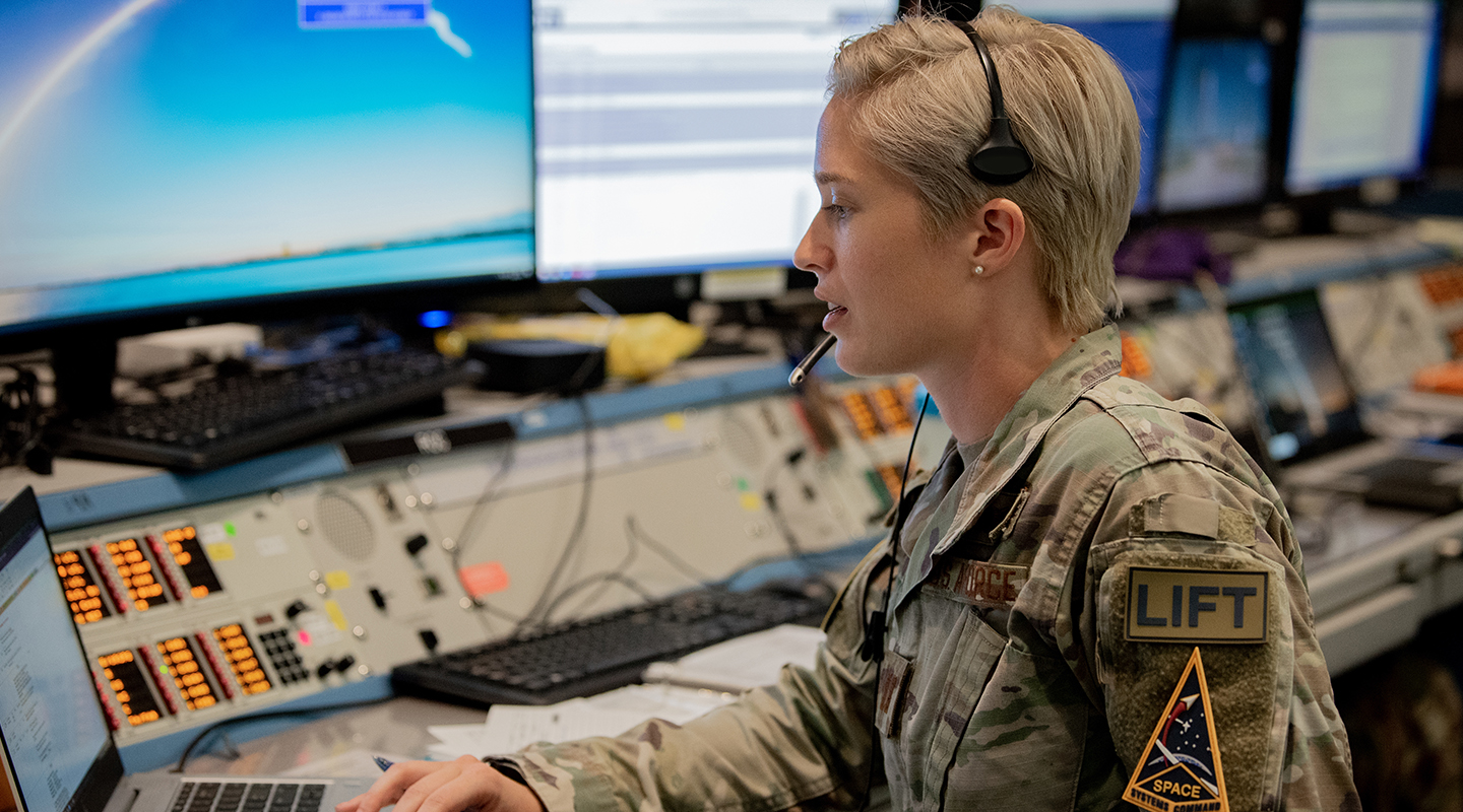 airman reviewing content on laptop