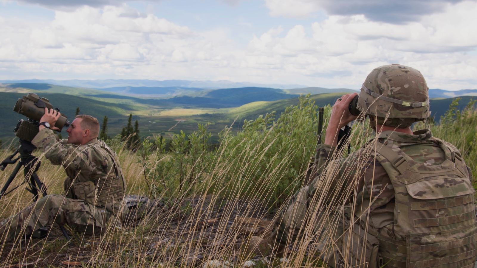 airmen in field on the lookout