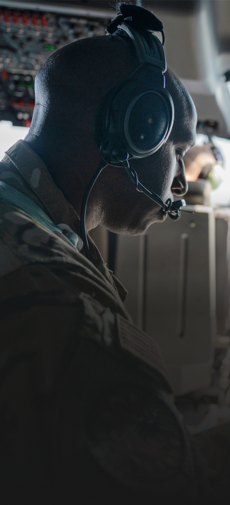 officer wearing headgear looking down