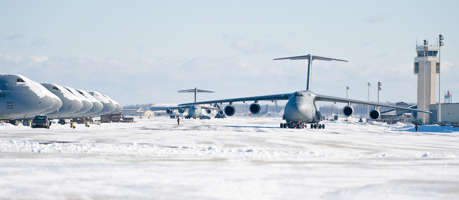 Air National Guard planes on an icy Delaware airfield