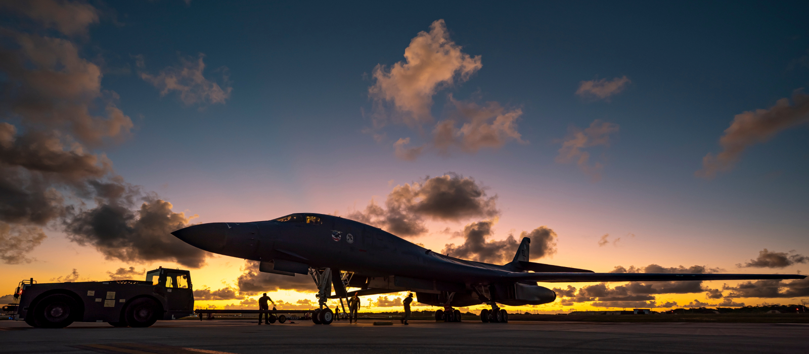 Air National Guard plane in silhouette in Guam at sunset