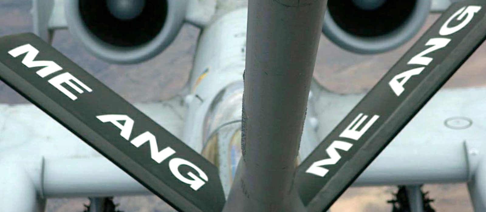 Air National Guard plane being refueled over Maine