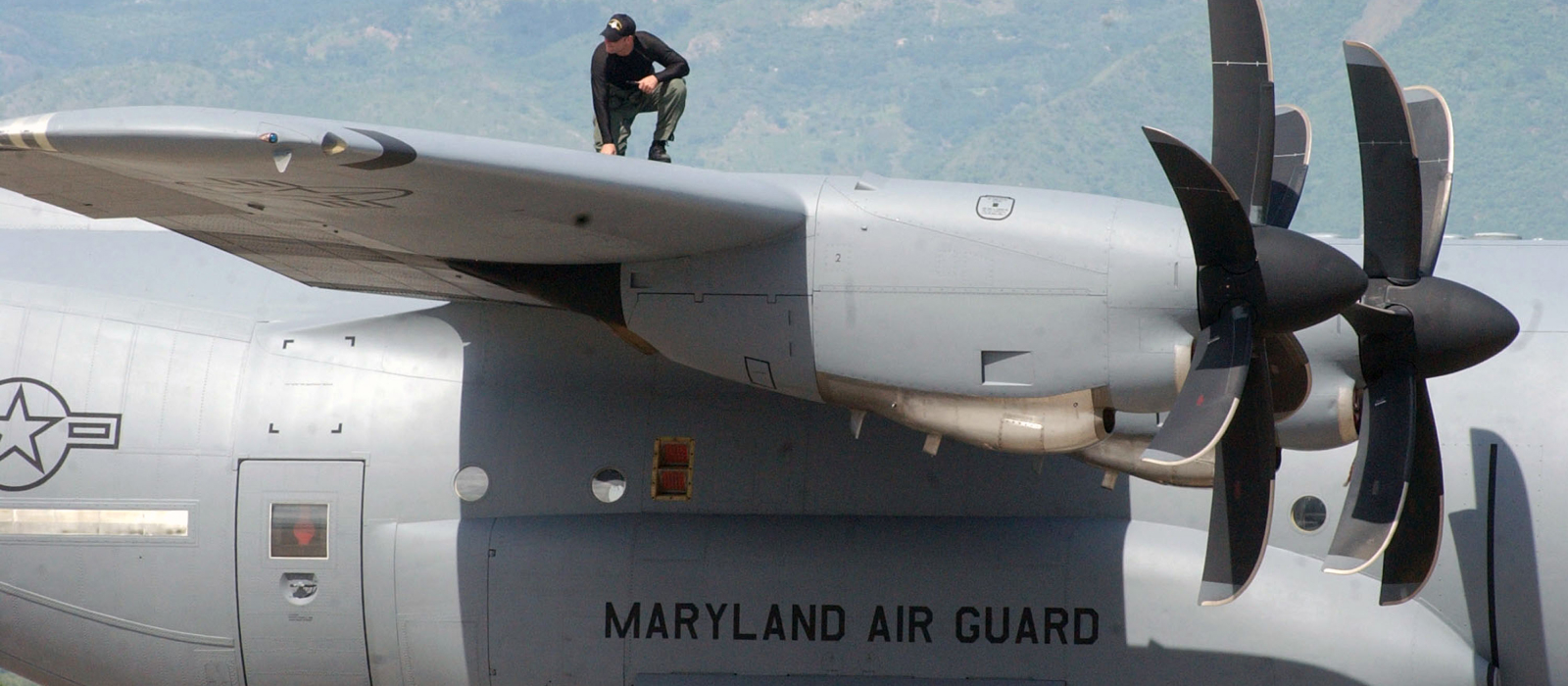 Air National Guard maintainers inspecting plane