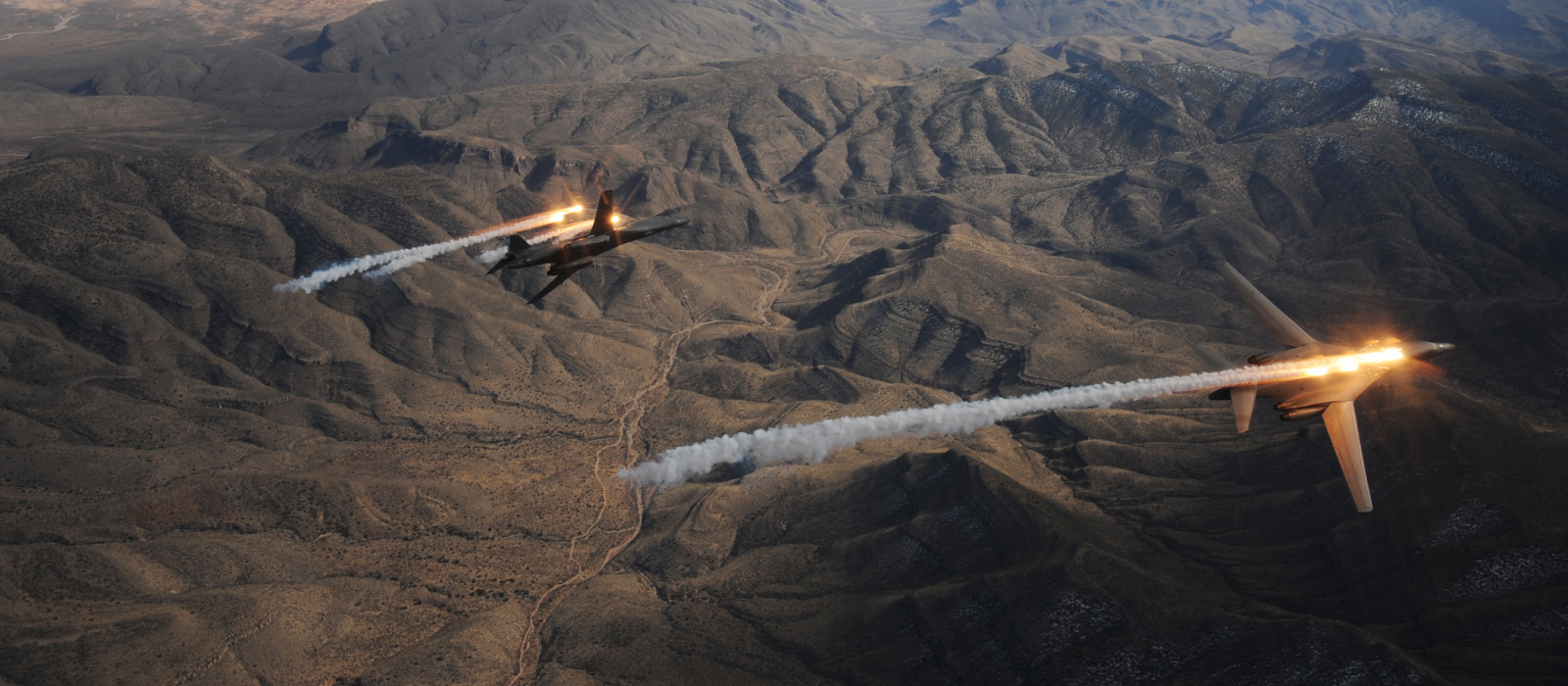 Air National Guard planes flying over canyon