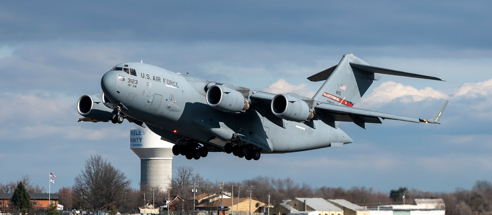 Air National Guard plane flying over West Virginia airfield