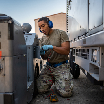 maintainer working on a routine maintenance