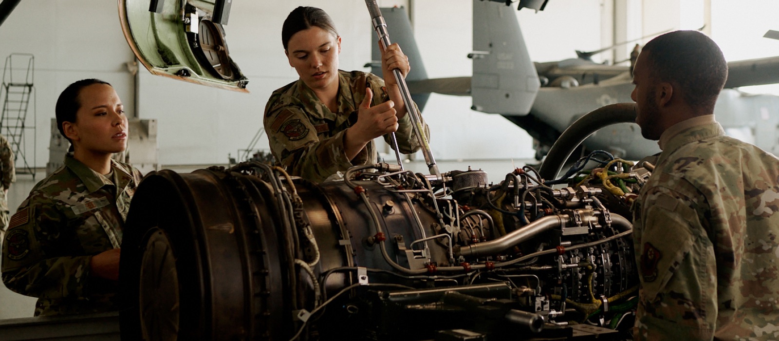 Male and female Airmen posing